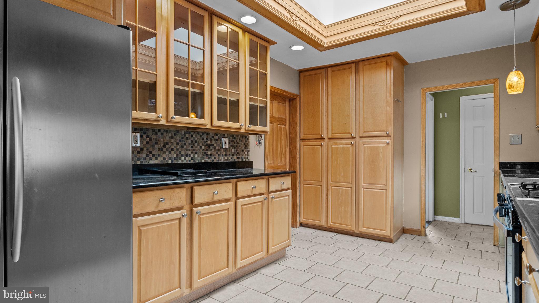 69 Crooked Billet Road Hatboro, PA 19040 - Photo 6 of 33 a view of a refrigerator and an cabinets