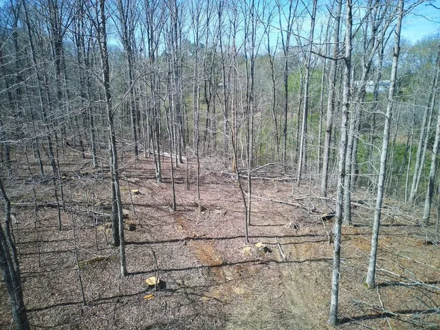 a view of wooden fence of a house