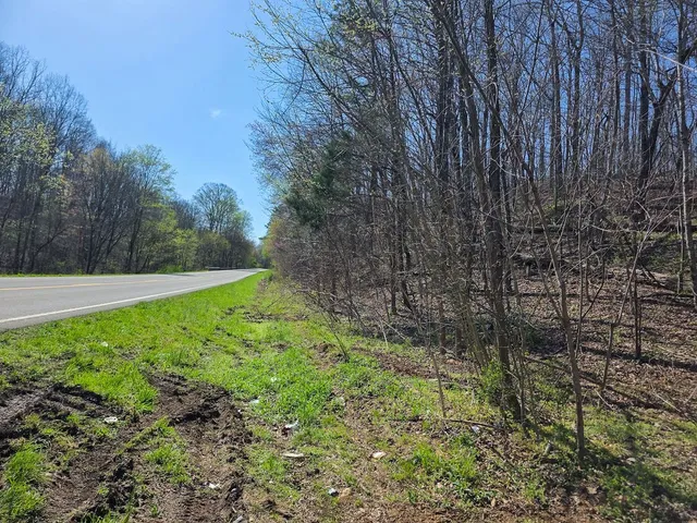 a sign that is on the side of the road