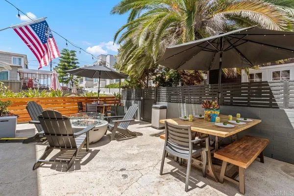 a view of a chairs and table in a patio