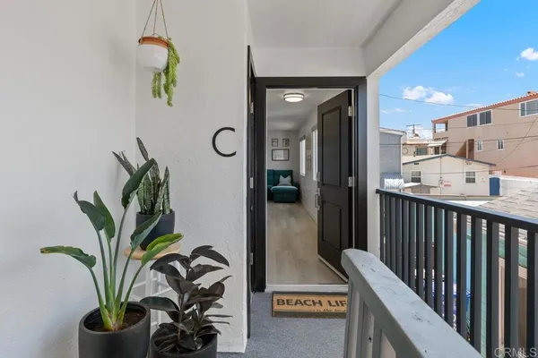a view of a hallway with washer and dryer