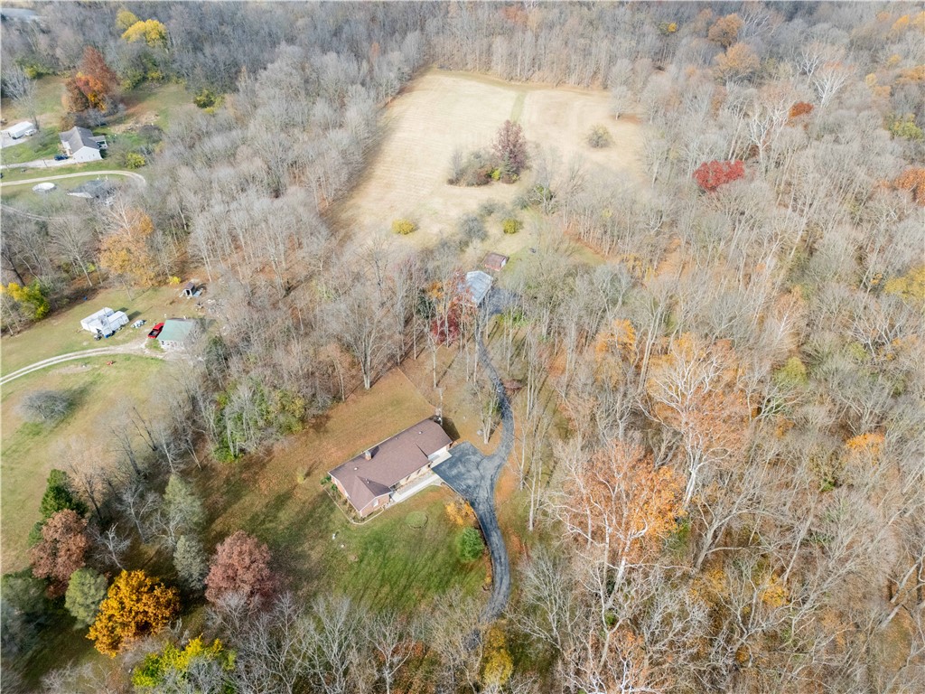 18333 Lefevre Number 2 Road Sidney, OH 45365 - Photo 16 of 25 This expansive estate offers unparalleled privacy and serene natural beauty.