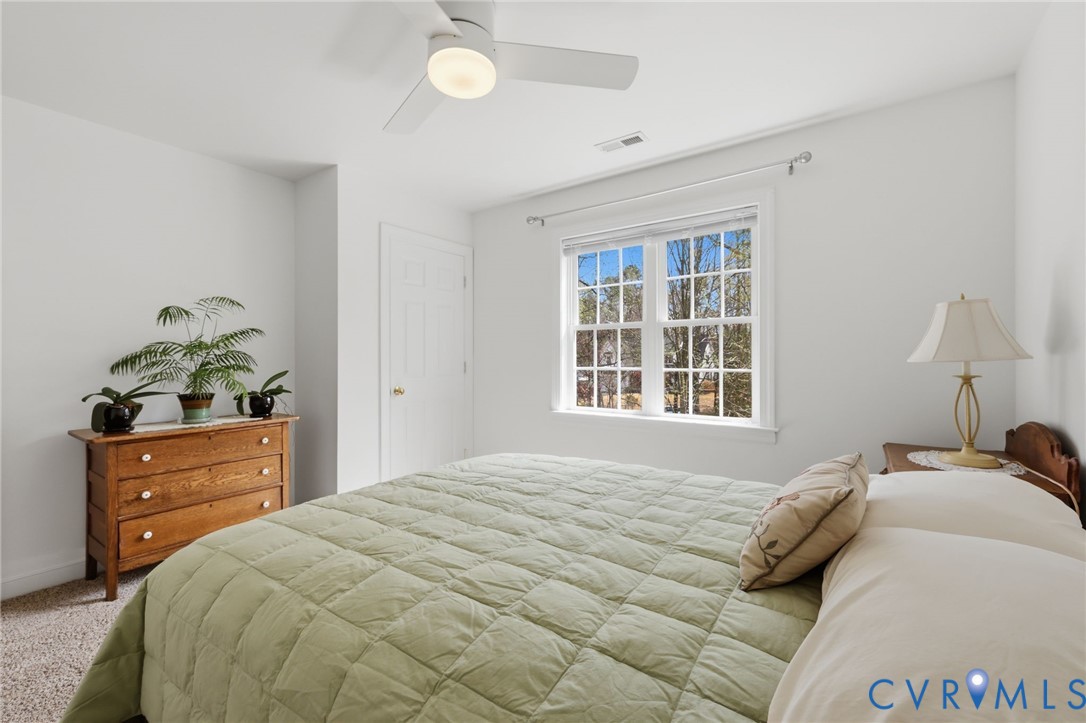 3236 Lakewood Road Glen Allen, VA 23060 - Photo 21 of 45 a bedroom with a bed and a dresser