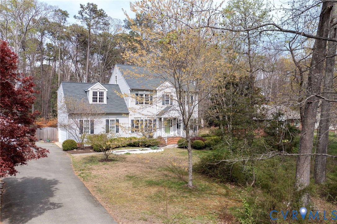 3236 Lakewood Road Glen Allen, VA 23060 - Photo 28 of 45 a front view of a house with a yard and large trees