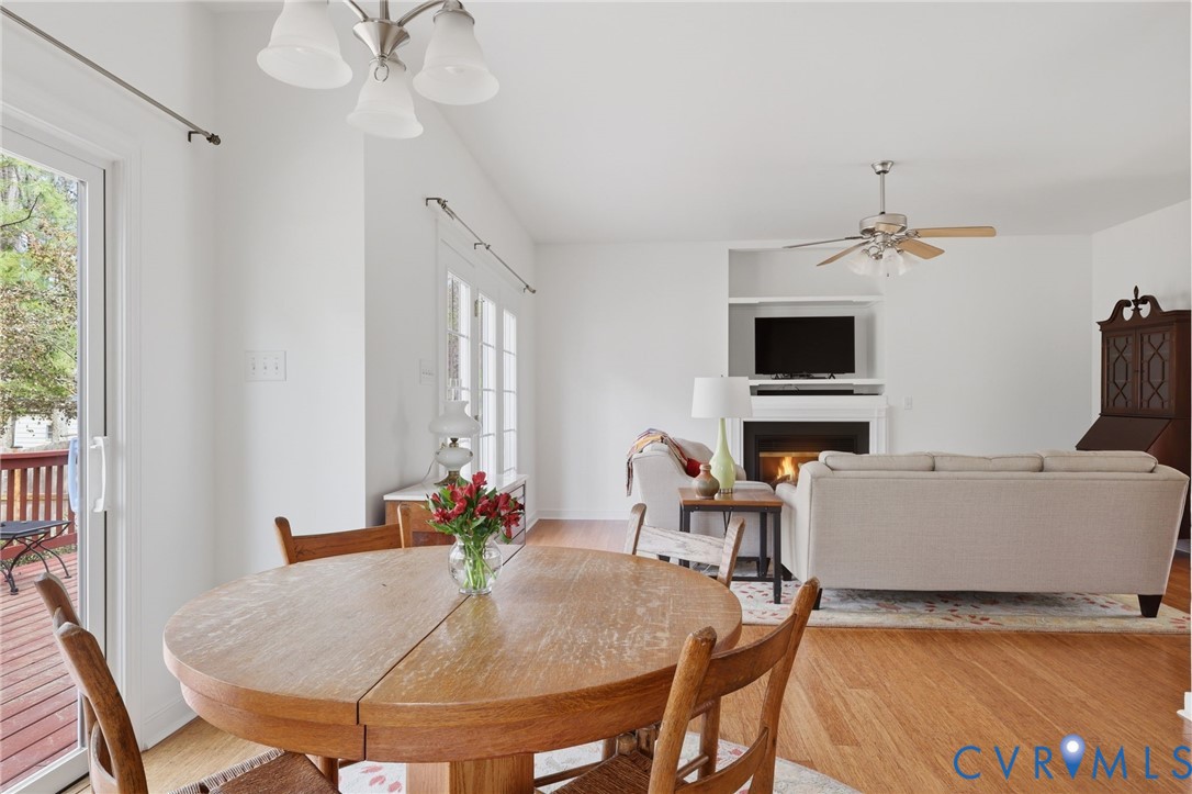 3236 Lakewood Road Glen Allen, VA 23060 - Photo 8 of 45 a living room with furniture a fireplace and a flat screen tv