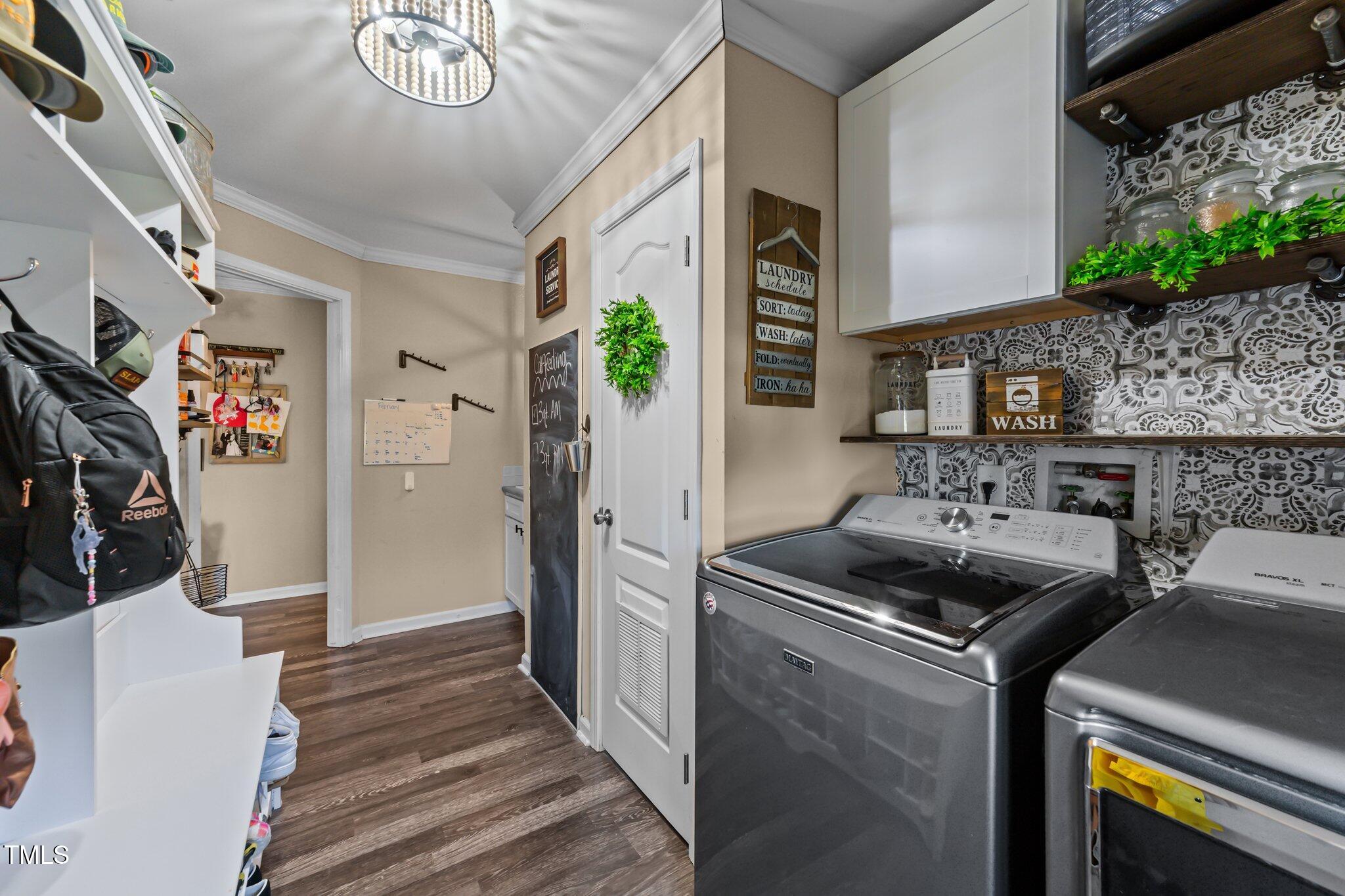 1500 Cheves Road Zebulon, NC 27597 - Photo 17 of 42 a kitchen that has a stove and a microwave oven