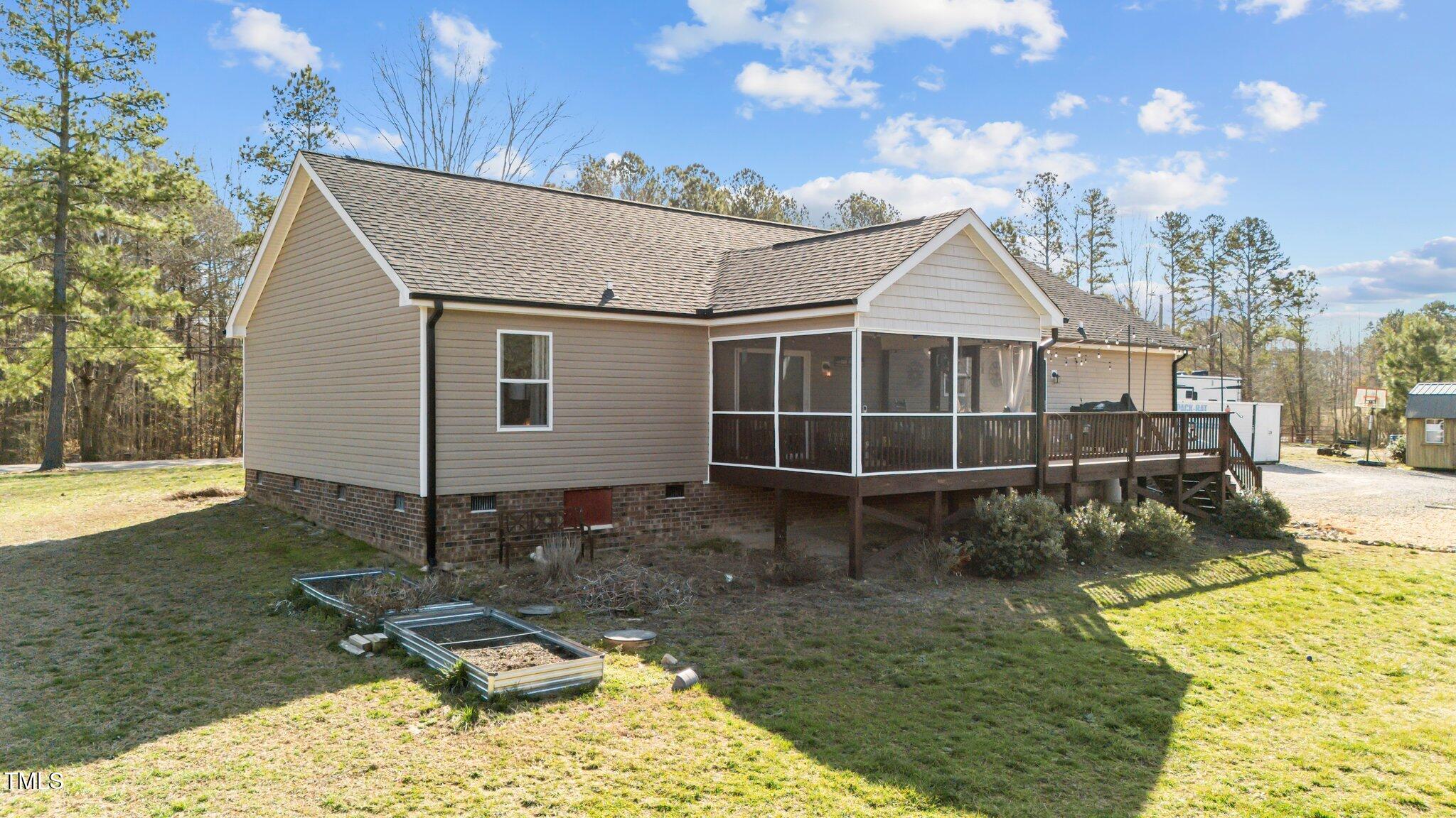 1500 Cheves Road Zebulon, NC 27597 - Photo 32 of 42 a view of a backyard