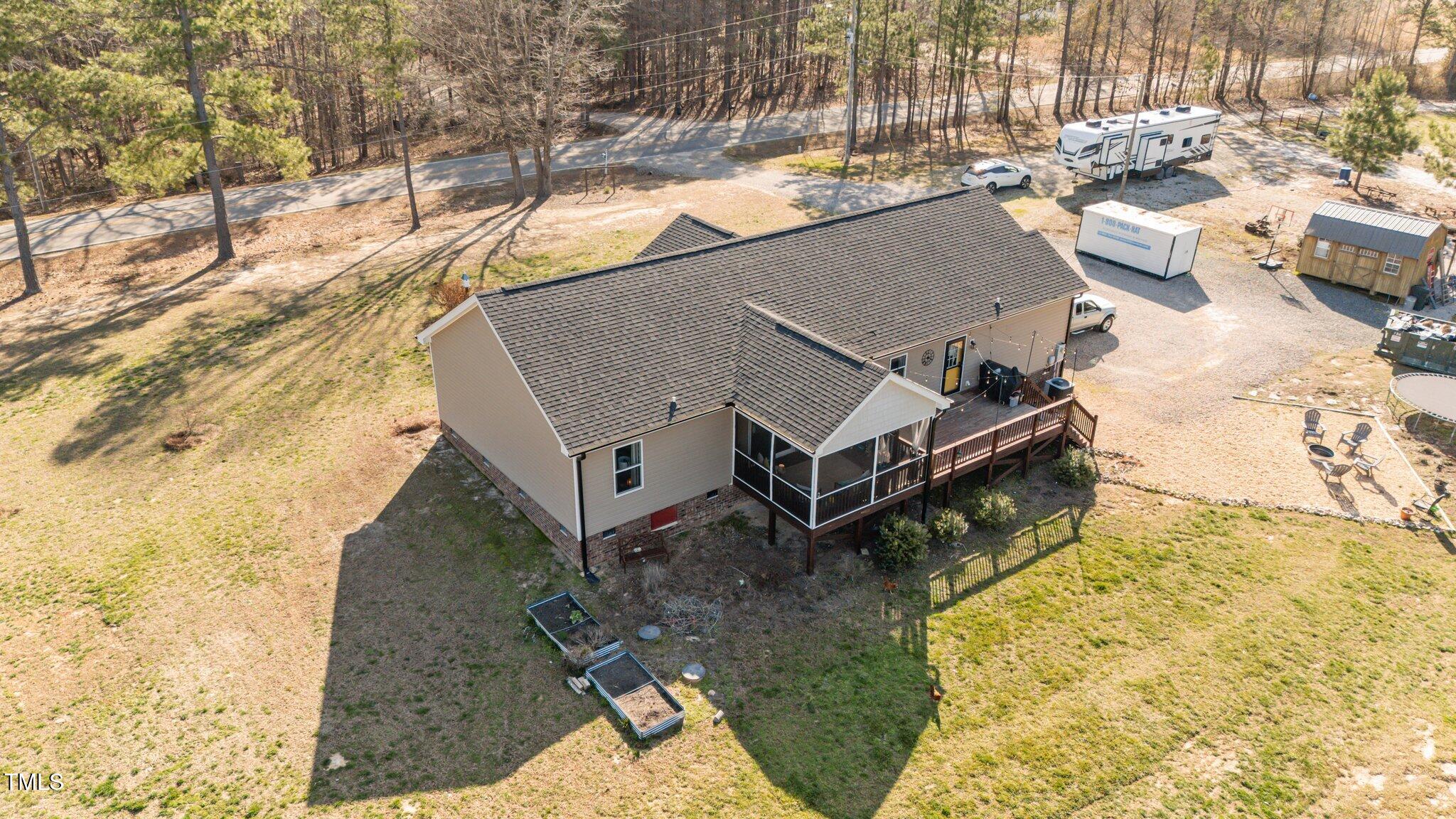 1500 Cheves Road Zebulon, NC 27597 - Photo 37 of 42 a view of roof with sitting area