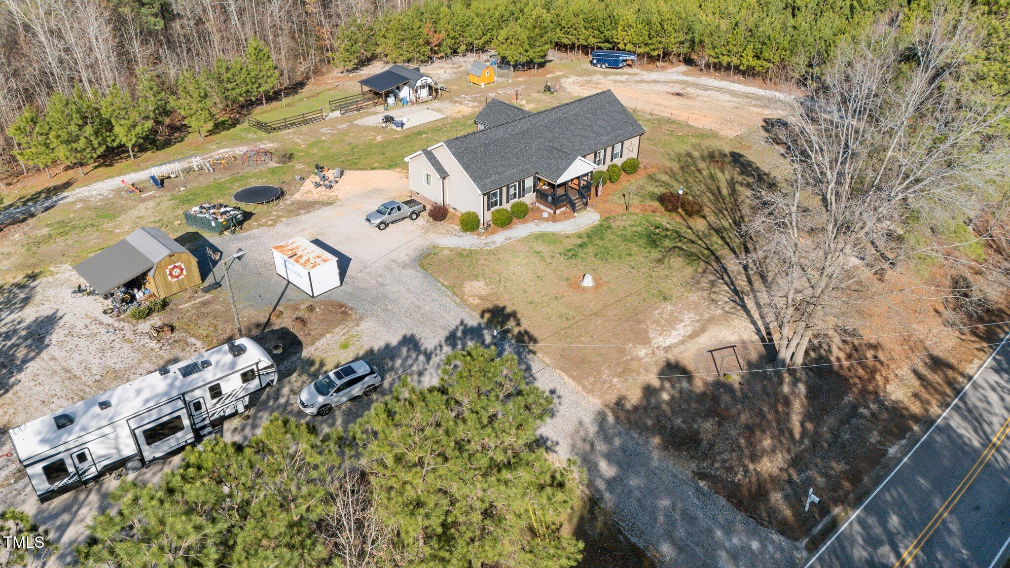 1500 Cheves Road Zebulon, NC 27597 - Photo 38 of 42 an aerial view of a house with a yard