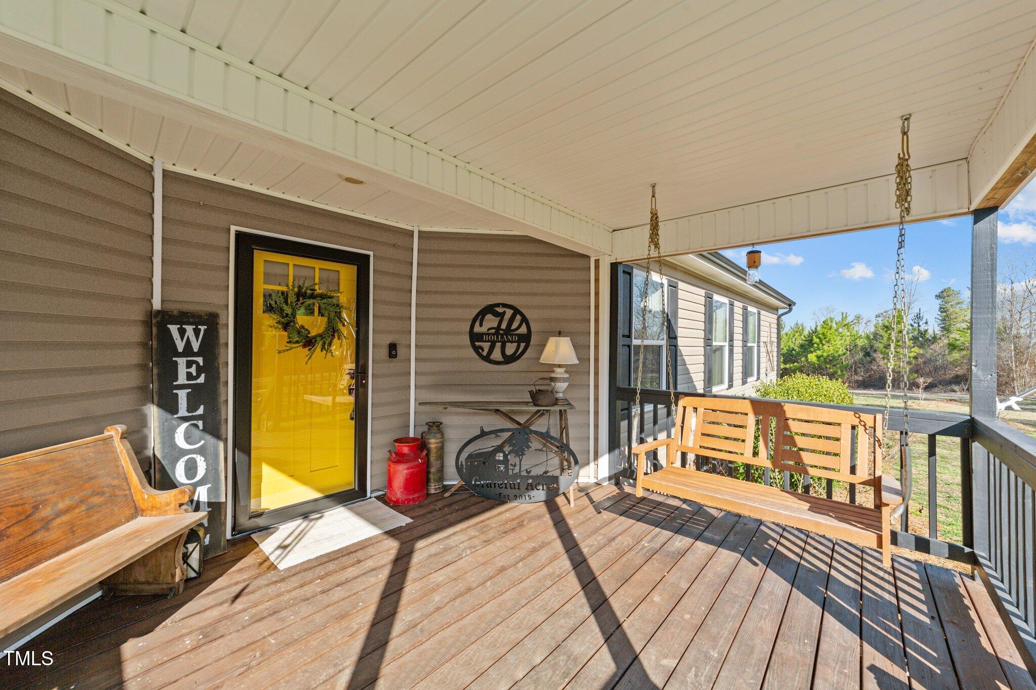 1500 Cheves Road Zebulon, NC 27597 - Photo 3 of 42 a view of a balcony with dining area