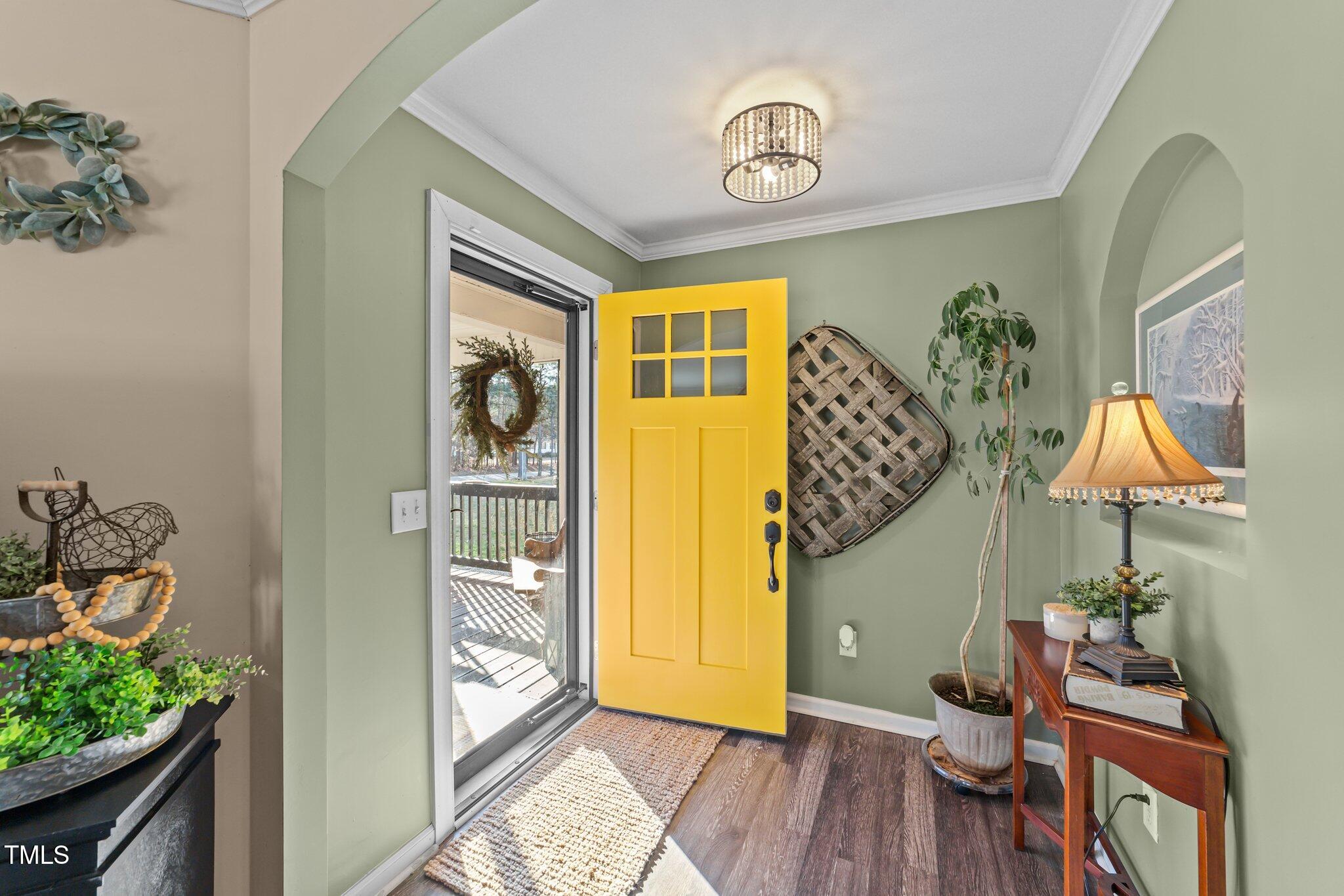 1500 Cheves Road Zebulon, NC 27597 - Photo 4 of 42 a view of an entryway with wooden floor