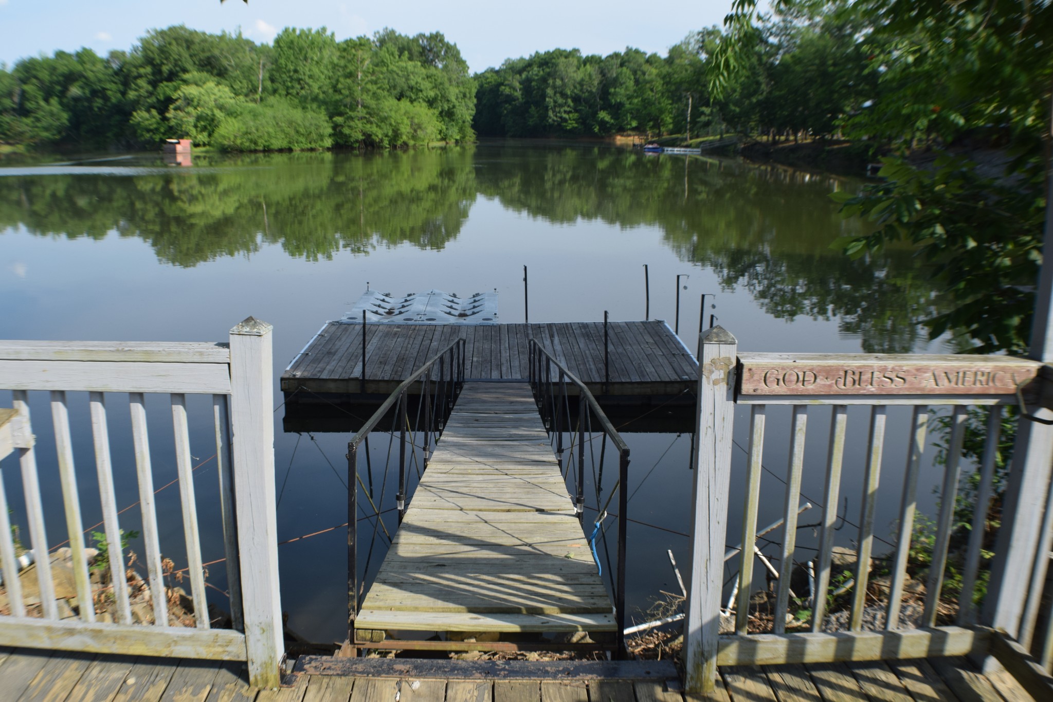 a view of a lake with deck