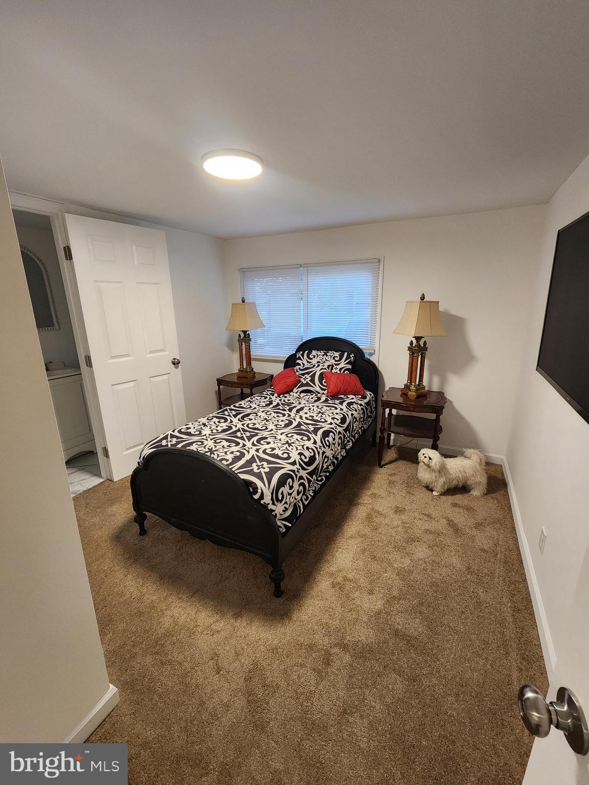 126 Country Lane Buena, NJ 08310 - Photo 4 of 12 a bedroom with a bed and a couch