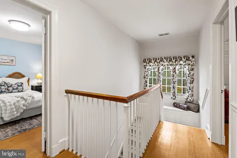 a very nice looking room with a big bed and a window