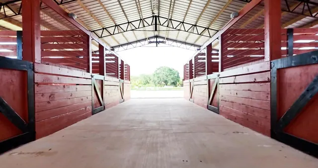 a view of an empty room with a staircase
