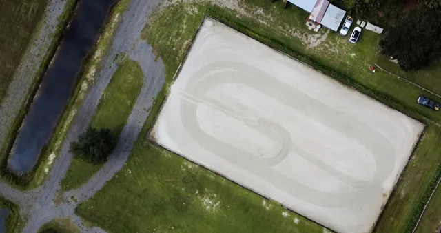 a view of swimming pool with a yard