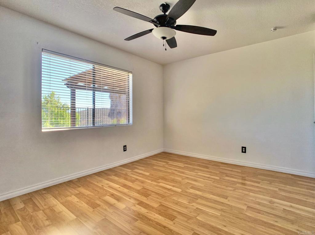 3331 Eton Greens Court Spring Valley, CA 91978 - Photo 18 of 39 a view of an empty room with a window