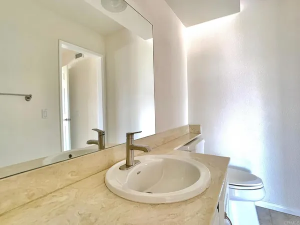 a bathroom with a sink and a toilet