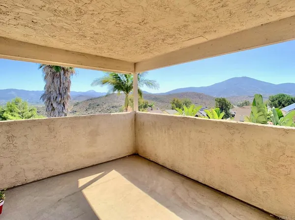 a view of a couches in a balcony