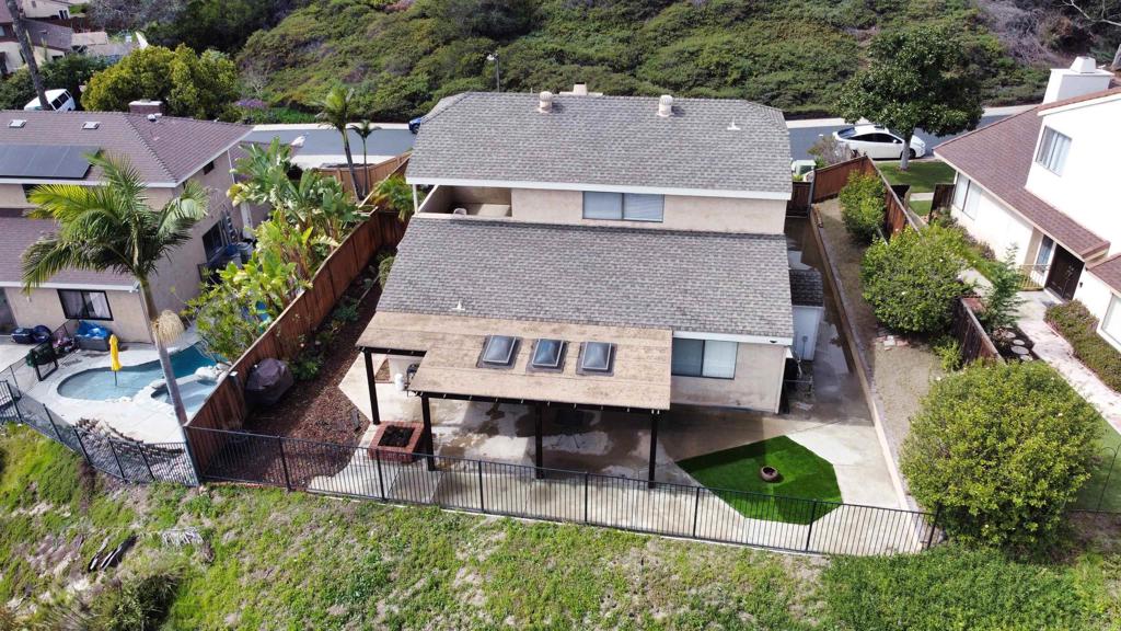 3331 Eton Greens Court Spring Valley, CA 91978 - Photo 33 of 39 an aerial view of a house with a yard table and chairs