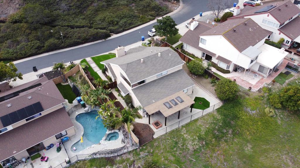 3331 Eton Greens Court Spring Valley, CA 91978 - Photo 34 of 39 an aerial view of house with yard