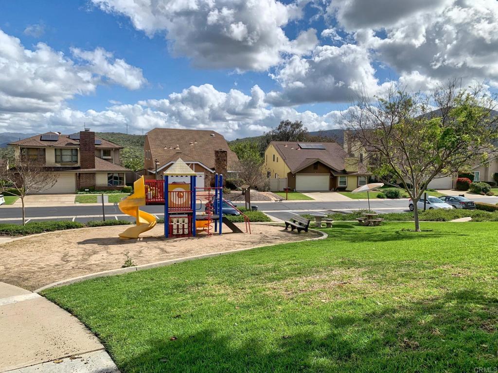 3331 Eton Greens Court Spring Valley, CA 91978 - Photo 39 of 39 a view of a park with swings and slides