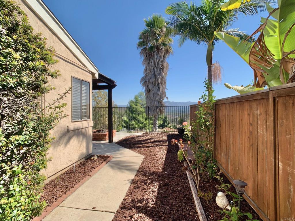 3331 Eton Greens Court Spring Valley, CA 91978 - Photo 6 of 39 a front view of a house with balcony