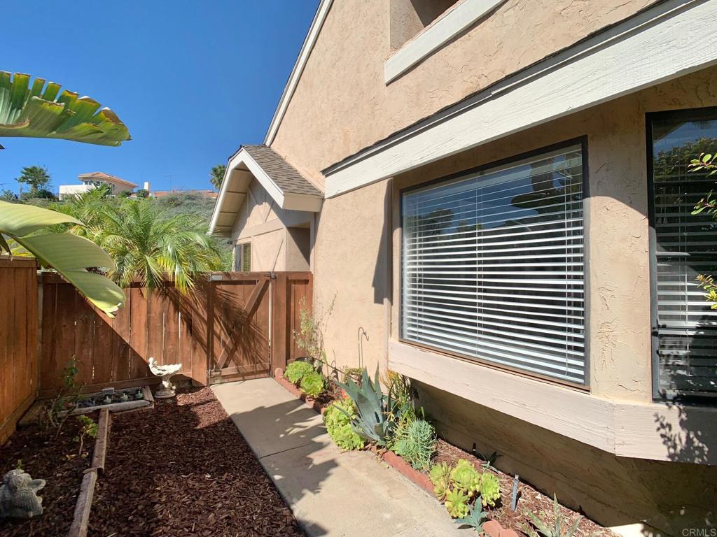 3331 Eton Greens Court Spring Valley, CA 91978 - Photo 7 of 39 a view of a house with a yard