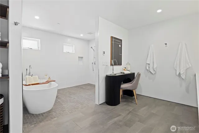 a view of a room with shelves and chandelier