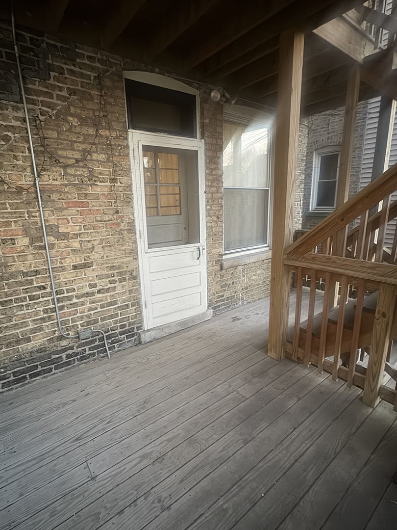 3030 West Belden Avenue Chicago, IL 60647 - Photo 8 of 12 a view of an entryway of a house