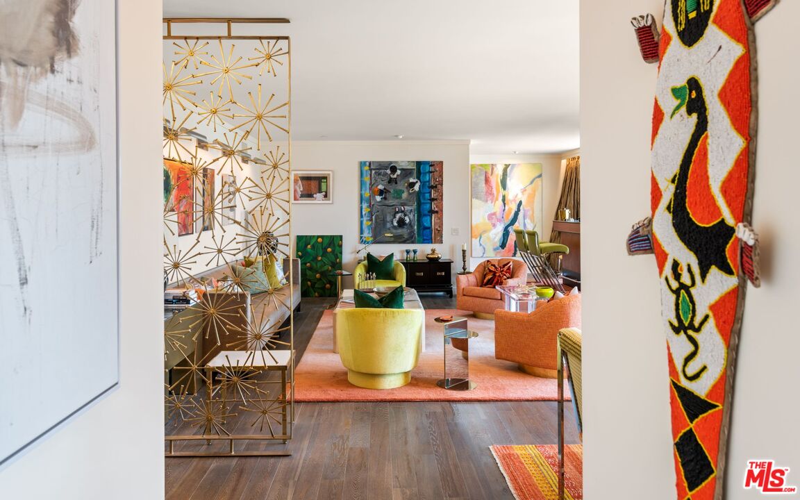 100 South Doheny Drive, Unit PH 1 Los Angeles, CA 90048 - Photo 20 of 31 a living room with furniture and a painting on the wall