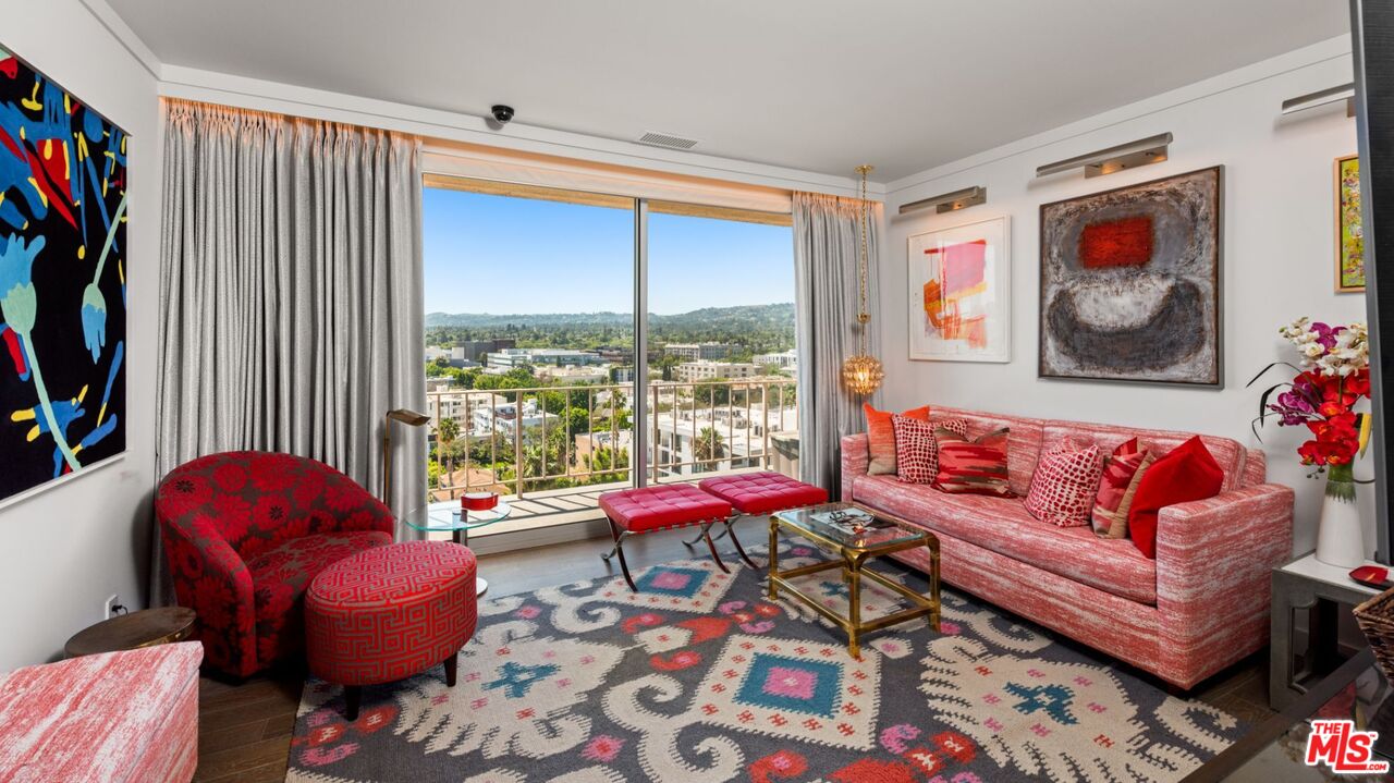 100 South Doheny Drive, Unit PH 1 Los Angeles, CA 90048 - Photo 24 of 31 a living room with furniture and a large window