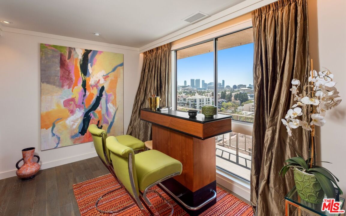 100 South Doheny Drive, Unit PH 1 Los Angeles, CA 90048 - Photo 9 of 31 a living room filled with furniture and a floor to ceiling window