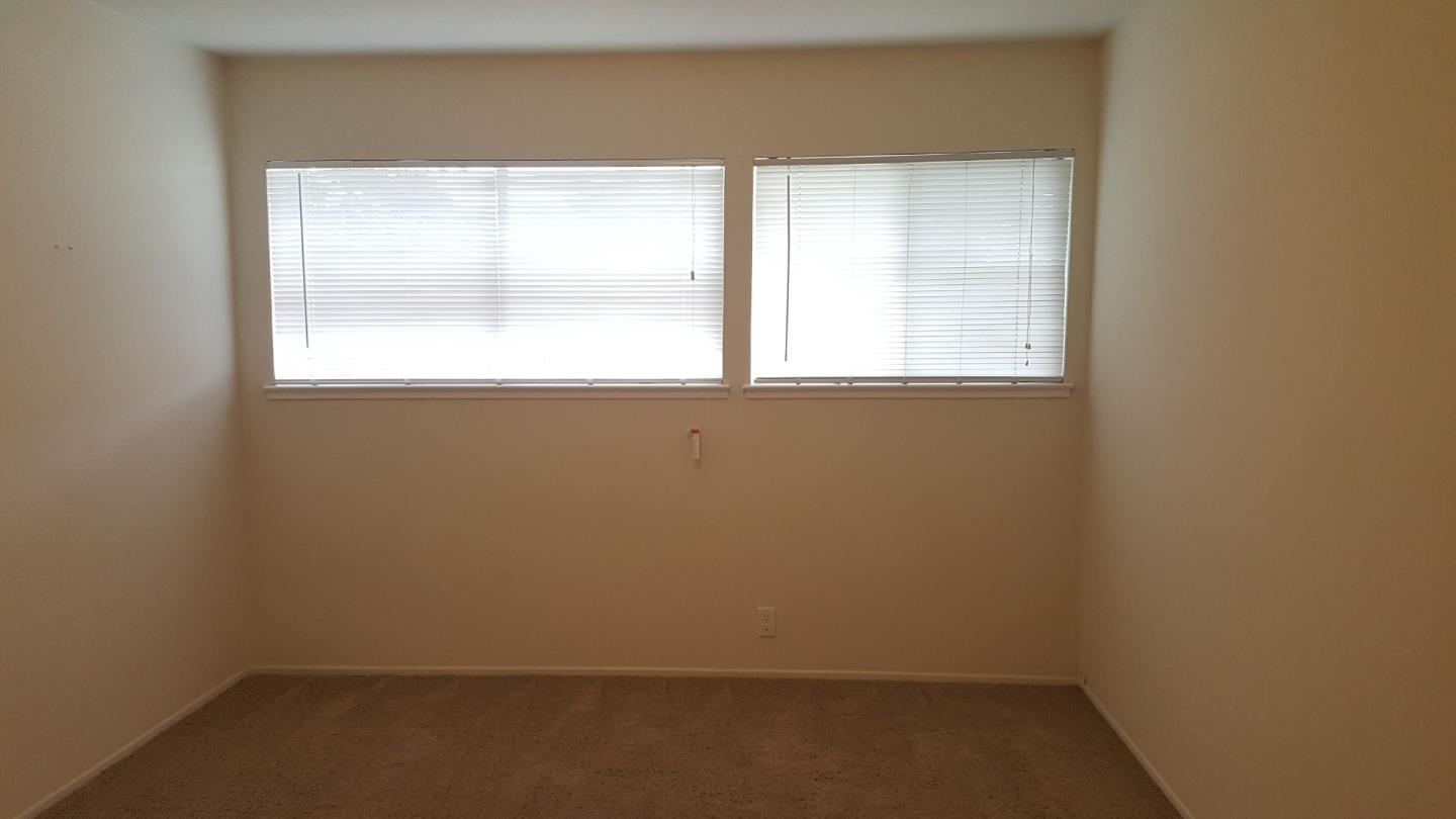 South Norfolk Street San Mateo, CA 94401 - Photo 5 of 8 an empty room with a window