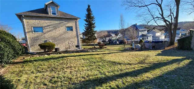 a view of house with outdoor space