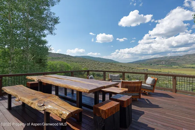 a view of a lake from a mountain