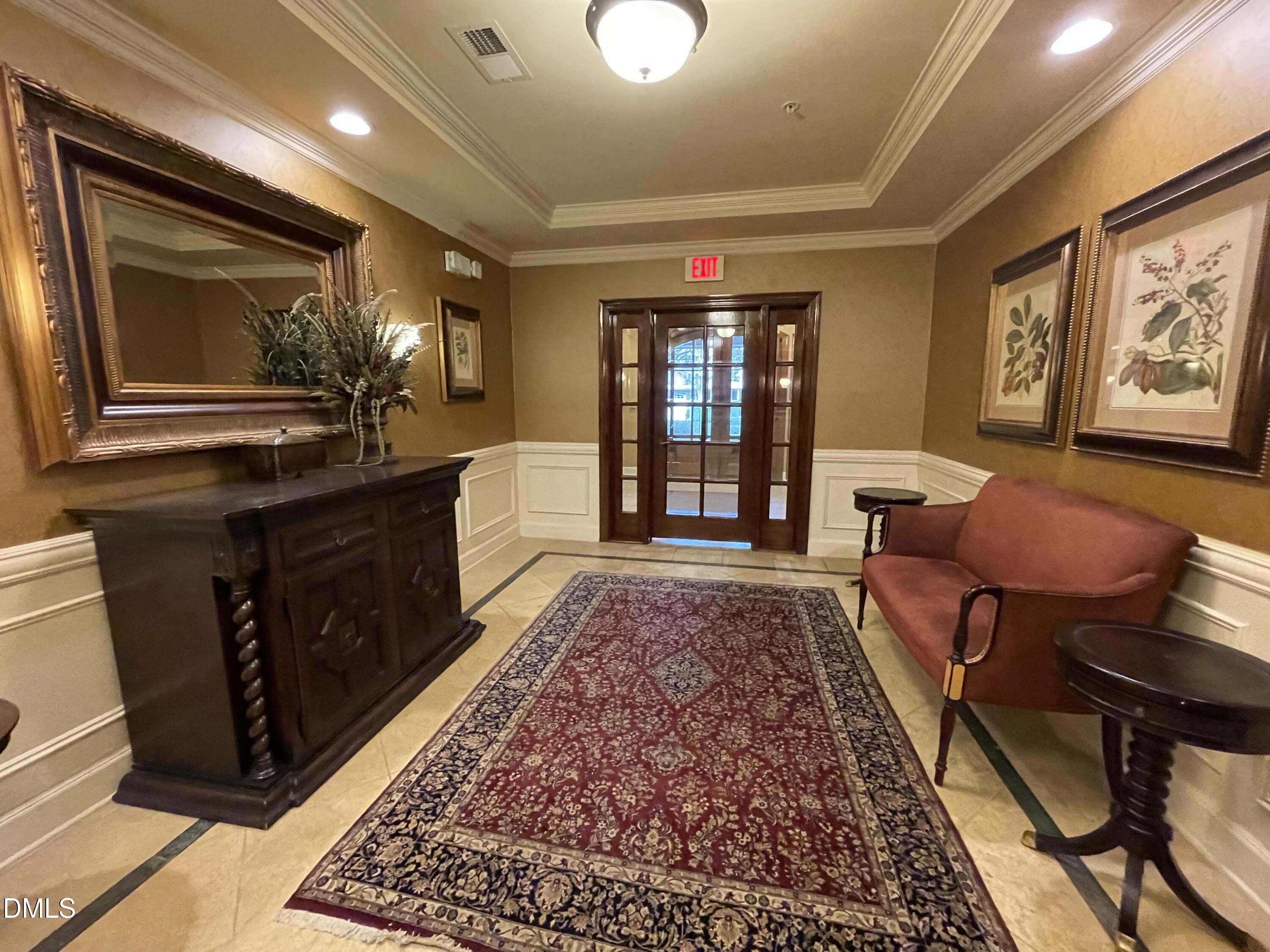 10411 Rosegate Court, Unit 3 Raleigh, NC 27617 - Photo 53 of 62 a living room with furniture rug and window
