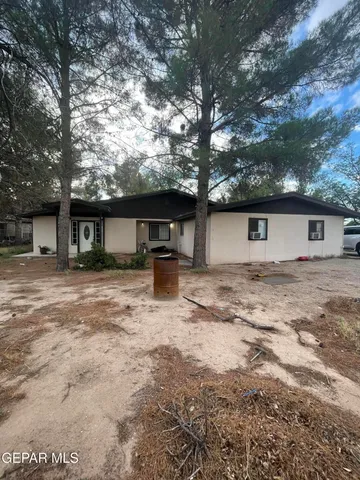 a front view of a house with a garage