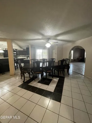 a view of a livingroom with a furniture and a fireplace