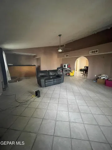 a large bathroom with a sink and mirror