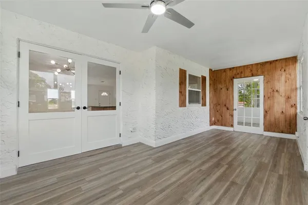 a view of a house with wooden floor and a window
