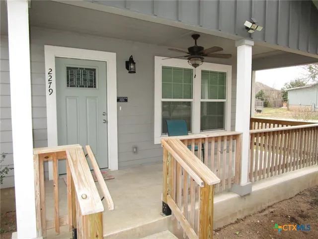 a view of an entryway with a front door