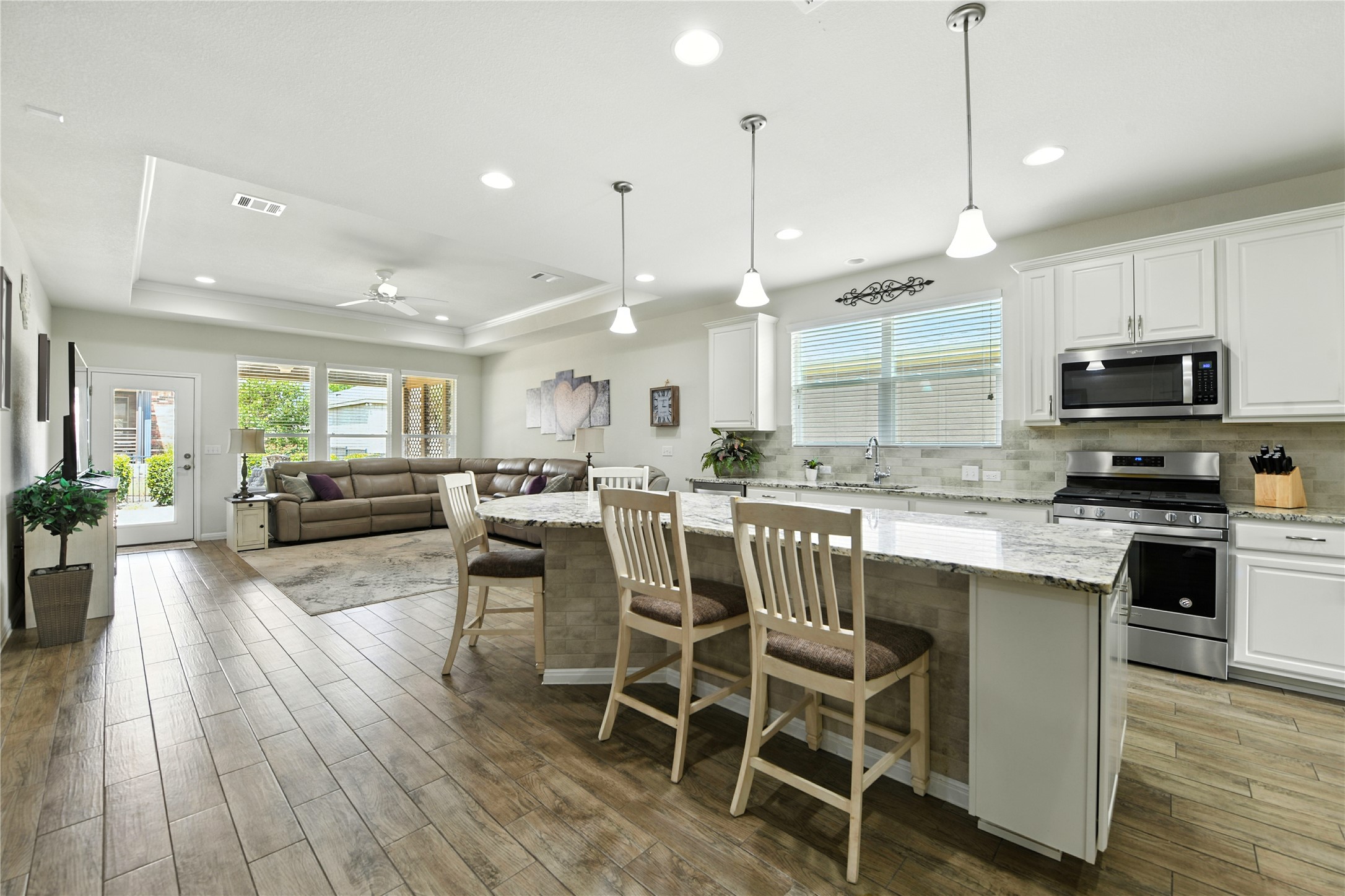 107 Calhoun Lane Georgetown, TX 78633 - Photo 1 of 36 Beautiful kitchen featuring a large center island finished with stone work