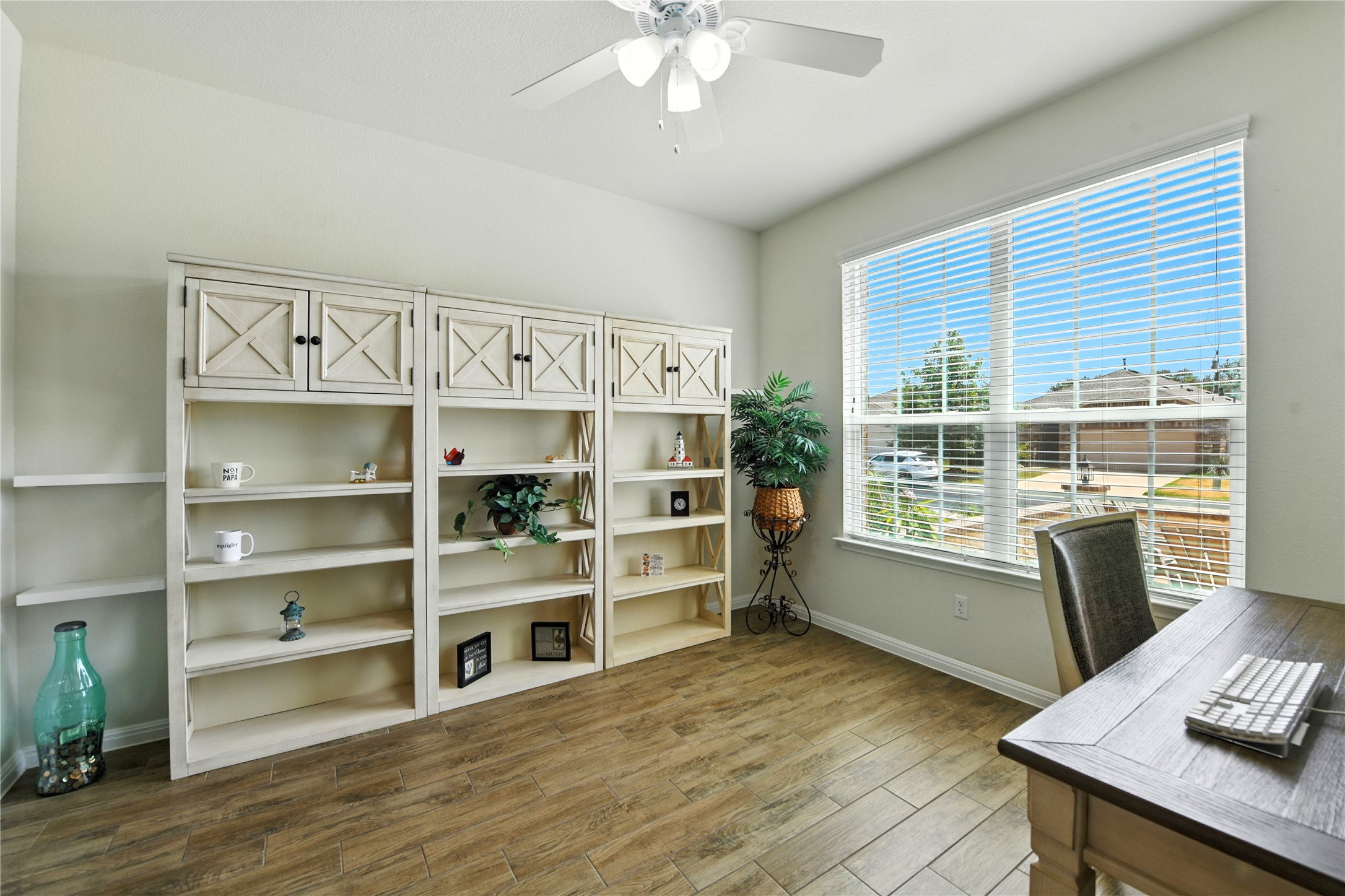 107 Calhoun Lane Georgetown, TX 78633 - Photo 13 of 36 Office area is off the entryway and overlooks the front yard