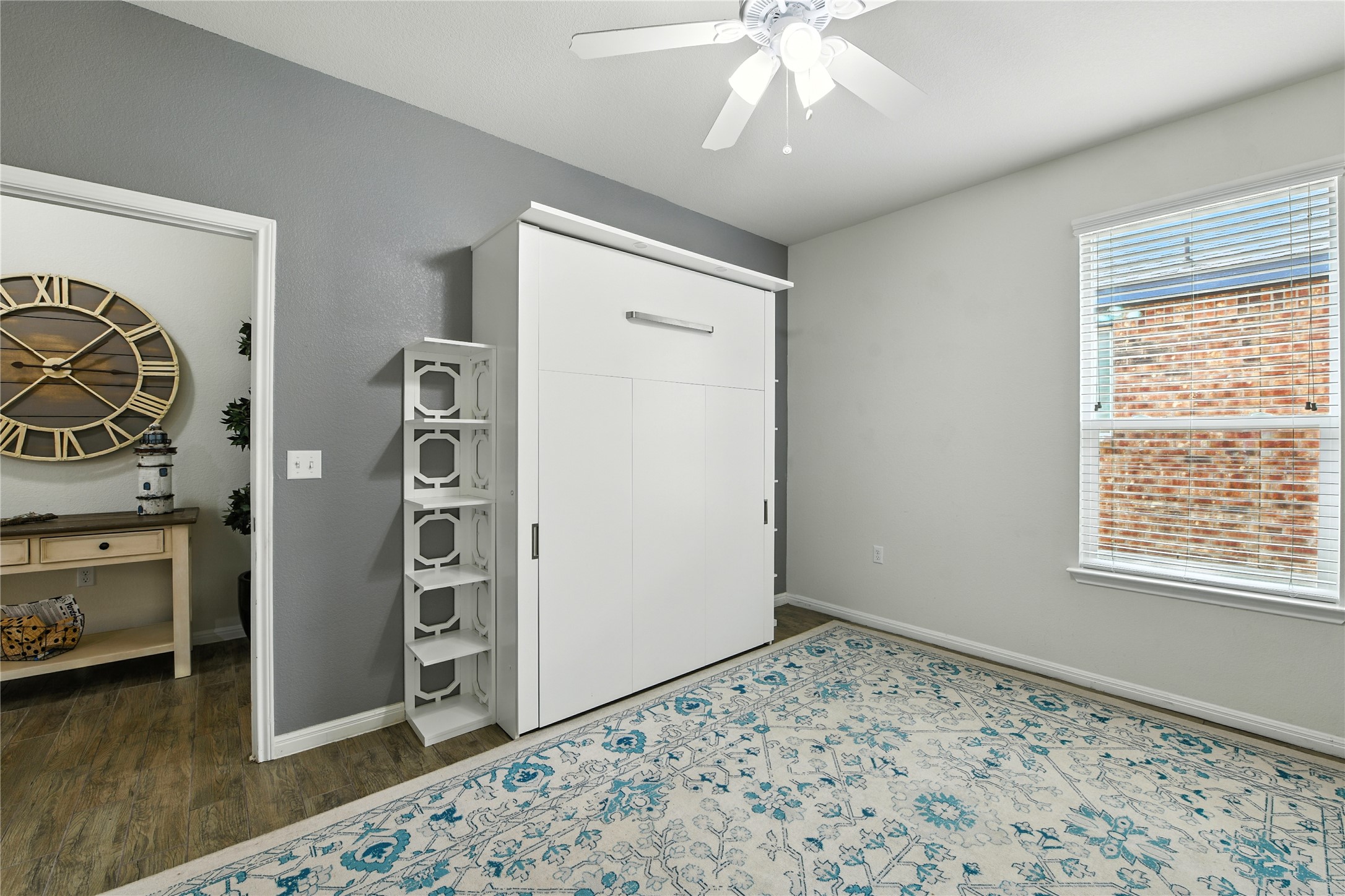 107 Calhoun Lane Georgetown, TX 78633 - Photo 23 of 36 Secondary bedroom with murphy bed