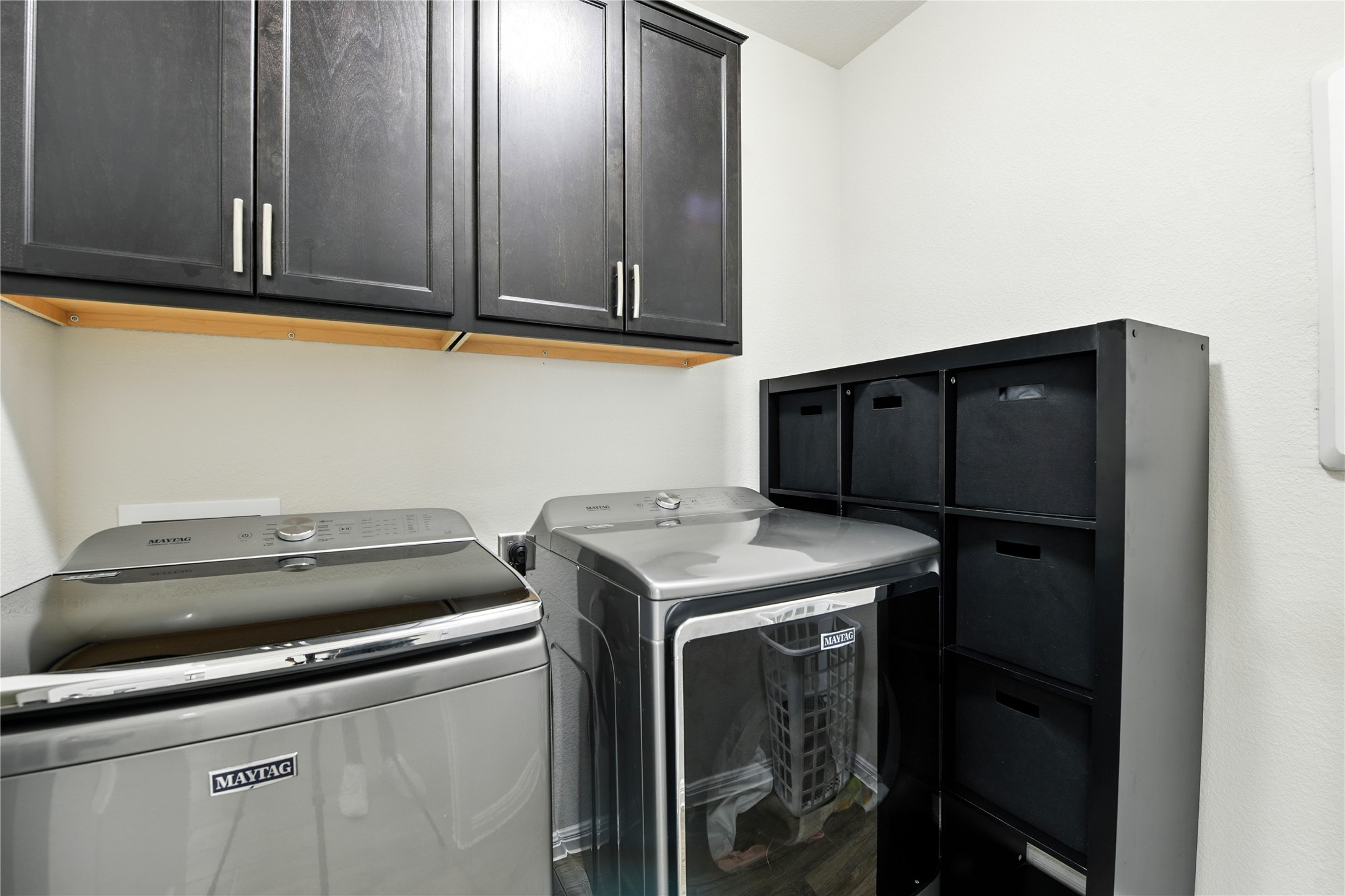 107 Calhoun Lane Georgetown, TX 78633 - Photo 27 of 36 Laundry room with cabinet space