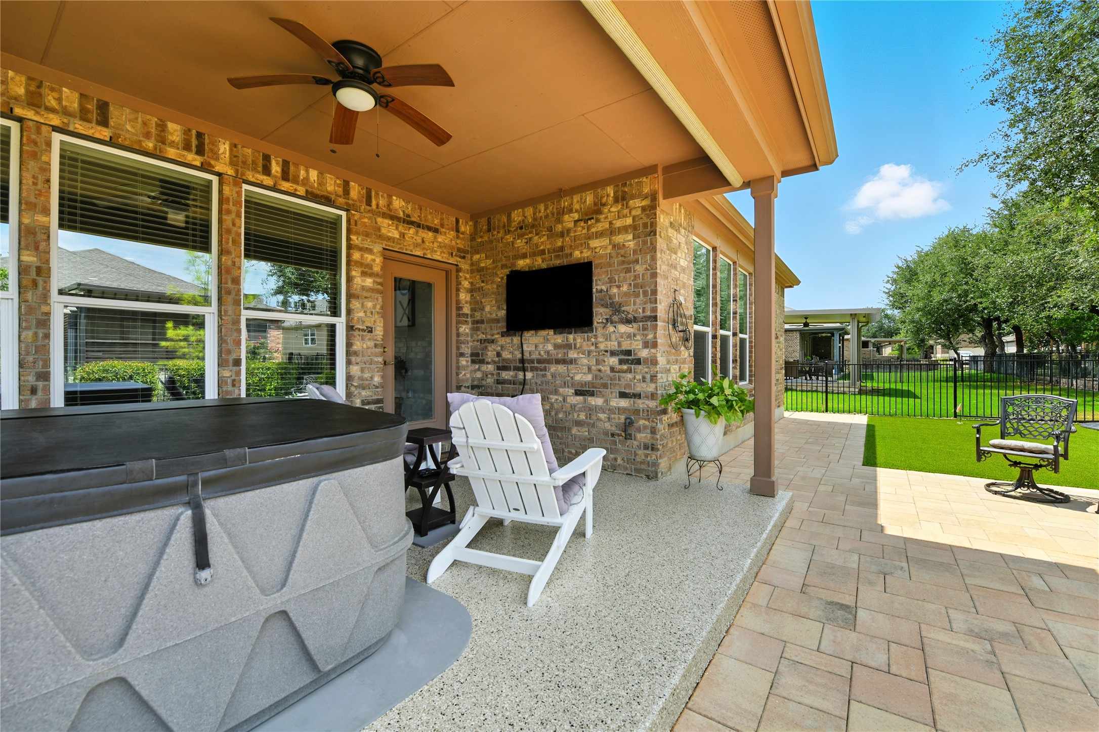 107 Calhoun Lane Georgetown, TX 78633 - Photo 33 of 36 Watch tv as you're sitting in the hot tub
