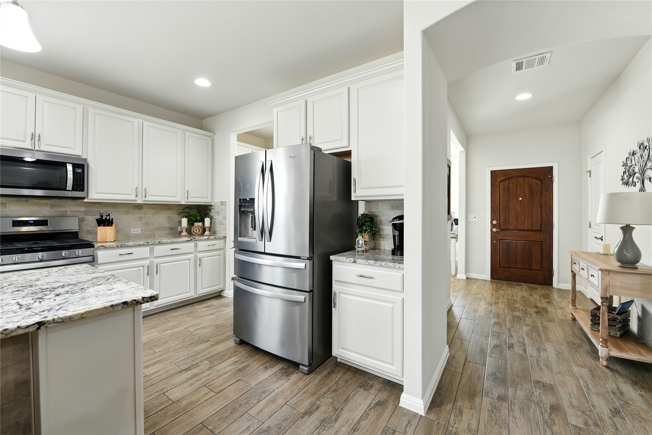 107 Calhoun Lane Georgetown, TX 78633 - Photo 7 of 36 Another angle of the beautiful kitchen