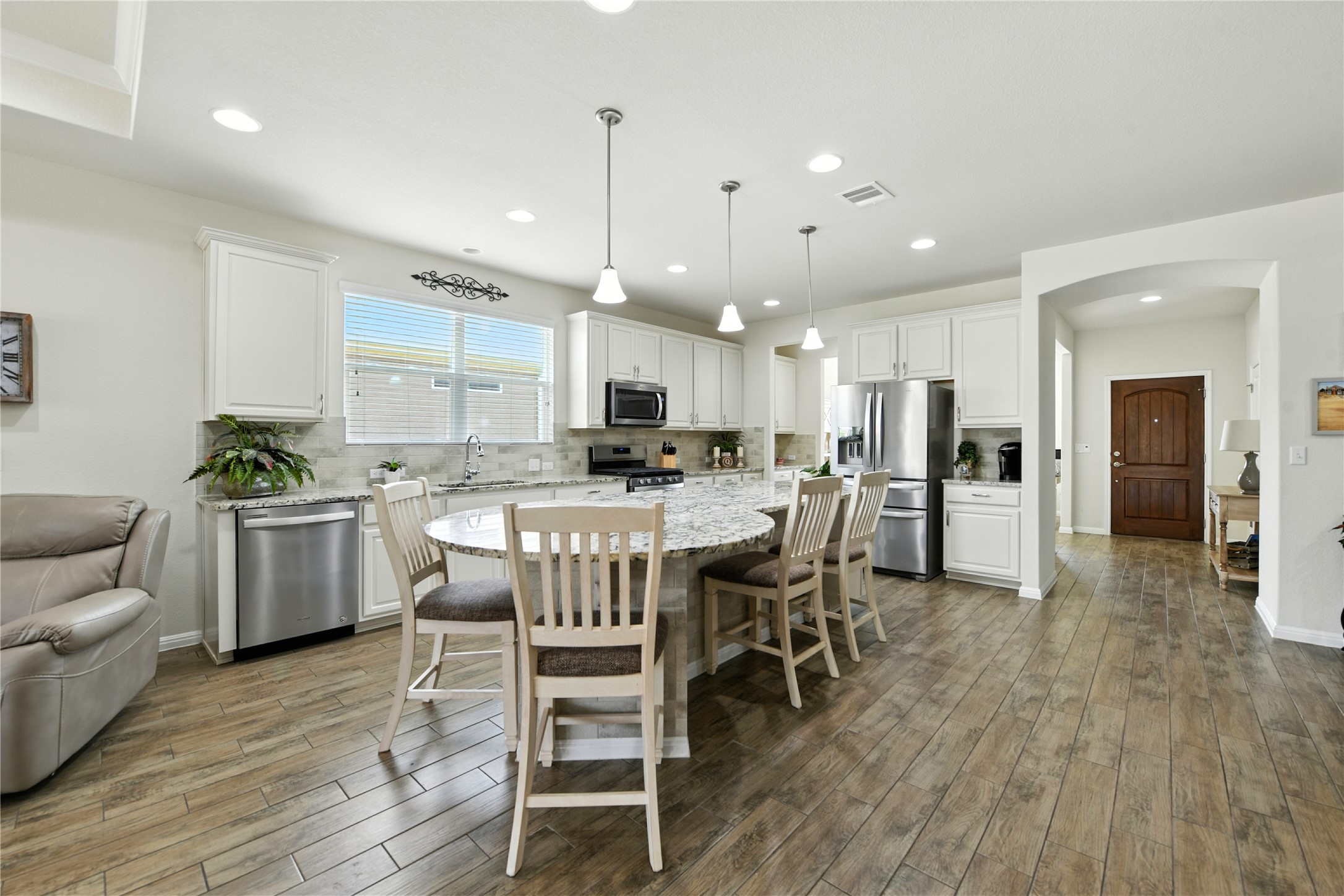107 Calhoun Lane Georgetown, TX 78633 - Photo 8 of 36 View of kitchen from the dining area