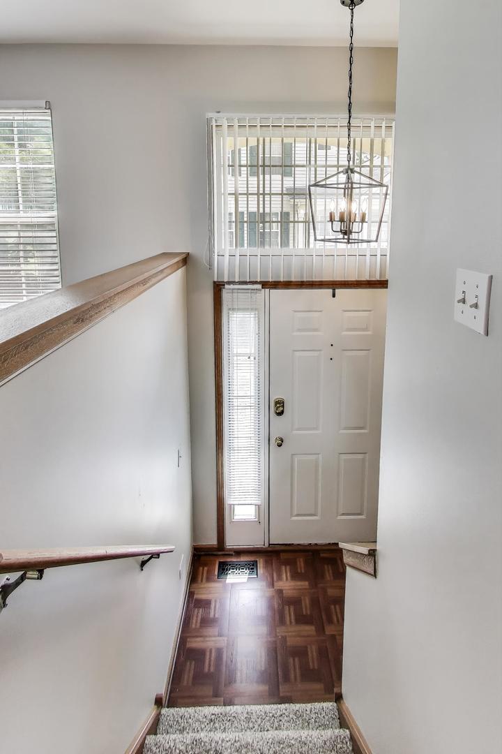 985 Manchester Circle, Unit 985 Grayslake, IL 60030 - Photo 3 of 17 a view of front door